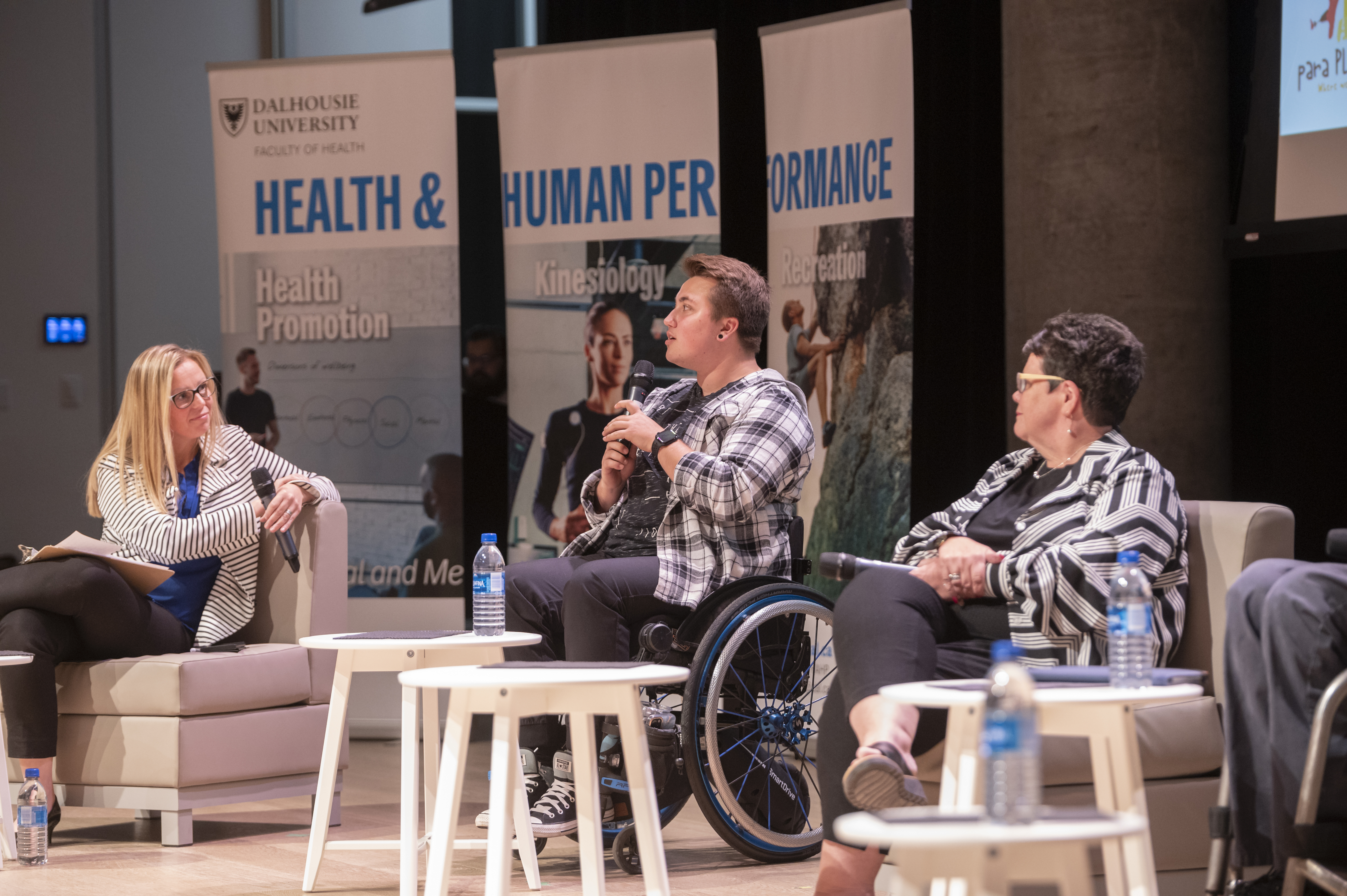 a group of folk with lived experience of disability on stage