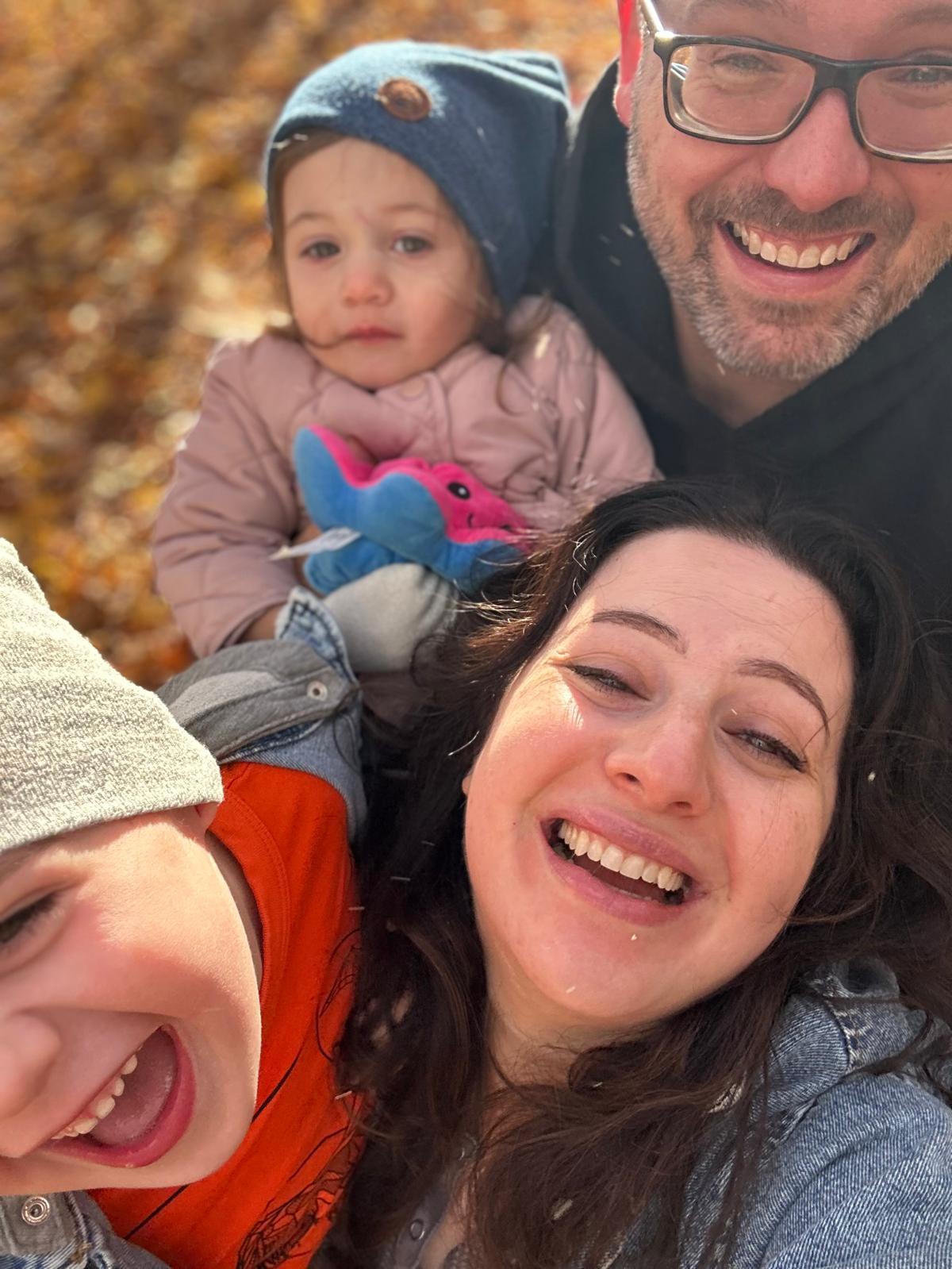 Matt Shaw with his his wife and two kids out for a walk.