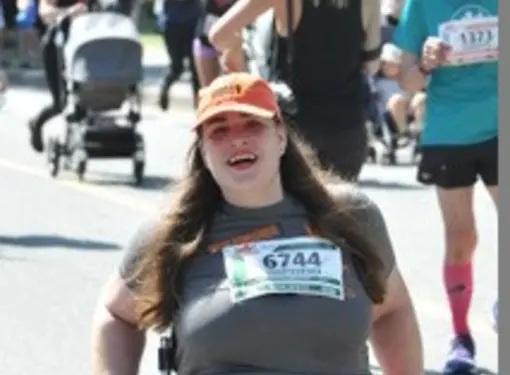 Jenna participating in a marathon