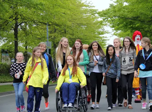 Group of girls, one wheelchair user